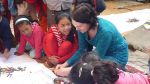 Anne teaching Nepali children the basics of colour mixing.